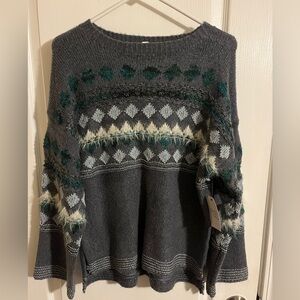 Time and True
Size small (4-6)
Gray with green, light blue, and white details